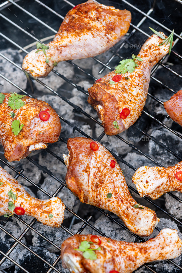 Chicken Drumstick Legs Grilling on Charcoal BBQ. Summer Picnic Food in